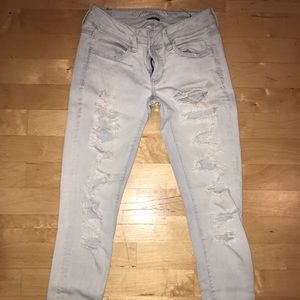 Light wash ripped skinny jeans